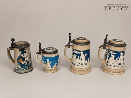 Four Villeroy and Boch Mettlach Steins